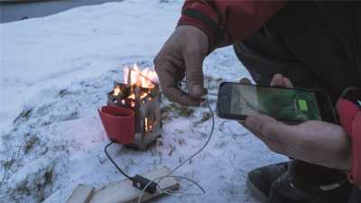 Woodsman stove and charger